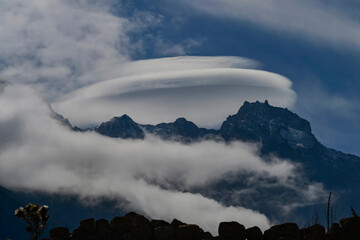 Lenticular cloud over the Caucasus mountains is one of the most beautiful and rare phenomena, in the village of Verhnya Balkaria,the Republic of Kabardino-Balkaria. Russia