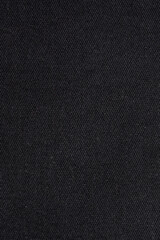 Dark gray background. The texture of the fabric is dark gray. Sulfur fabric texture