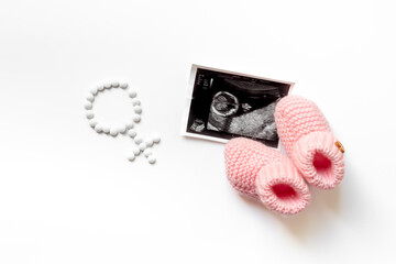 Ultrasound image of the baby and medicines. Pregnancy. Treatment of female infertility concept