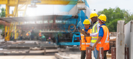 Site manager and builder control concrete truck mixer on construction site, Foreman and workers team meeting for planning project at construction site