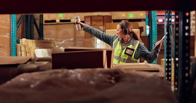Shelf, headphones and woman with dancing in warehouse for music, excited and good news at work. Logistics, supply chain and person with celebration in factory for ecommerce, dropshipping and success
