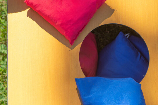 Corn hole selective focus copy space background image fun outdoor games, natural authentic light, playing a game