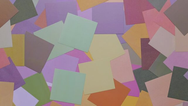 Colorful logo paper randomly placed horizontally background. Abstract geometric background.