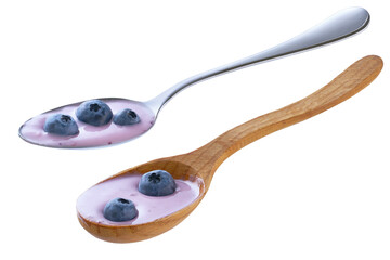 spoon with blueberry yogurt and fresh berries blueberries isolated on a white background.