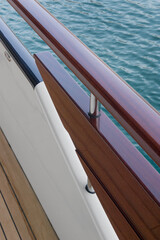 Luxury yacht. Motorboat at Mediterranean Sea. Coast of Turkey. Luxury life. Railing. Wooden. Chrome. 