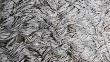 A soft, abstract, luxurious fur fabric texture background. Ideal for cozy, upscale interior designs, product photography, or fashion-related projects. Adds warmth and texture to any scene