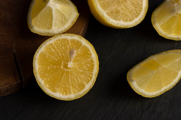 close-up of a table with slices of yellow lemon