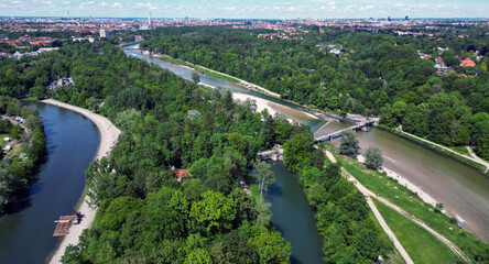 The Isar river flows into the city of Munich aerial view