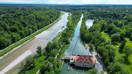 The Isar river flows into the city of Munich aerial view
