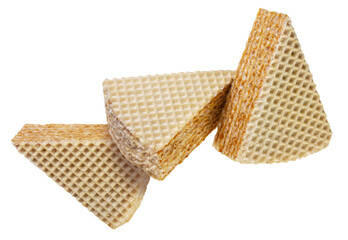 Pieces of wafer cake flying on white background. Isolated