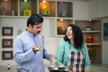 Indian Husband Tasting Food Made By Wife