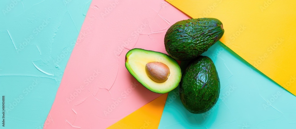 Poster avocado displayed on a vibrant decorative backdrop, with room for a copy space image.