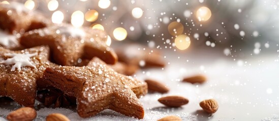Christmas recipe featuring ginger star cookies topped with sugar, cinnamon, and almonds set against a white blurred background with copy space image.