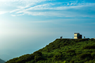 the top of the mountain under the blue sky