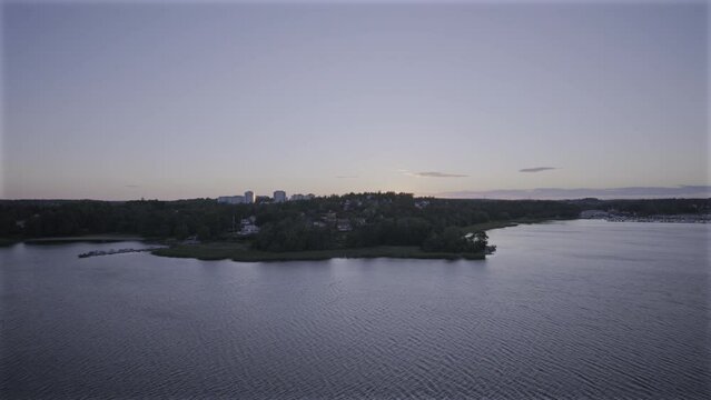 Aerial view of costal forest in Scandinavia at Sunset