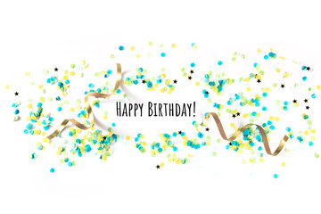 Happy birthday greeting card with confetti, golden stars and ribbons, with typography, on a white background