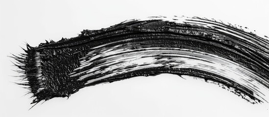 Obraz premium A close-up view of mascara texture against a plain white backdrop with ample space for additional imagery.
