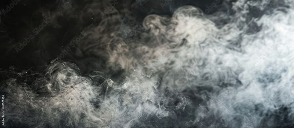 Poster Atmospheric smoke effect over a dark background creating a foggy or steamy texture with copy space image.