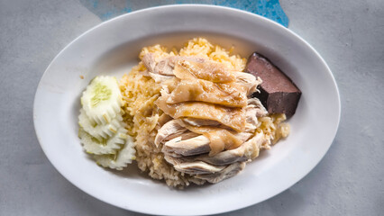 Chicken rice on a plate in a restaurant