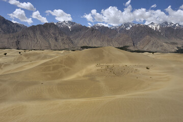 DESERT WITH SAND DUNES AROUND THE TOWN OF SKARDU IN NORTHERN PAKISTAN AT THE FOOT OF THE HIMALAYAS. 