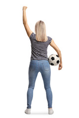 Rear view shot of a happy young woman cheering with a football