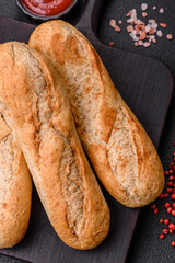 Crispy mini baguette with seeds and grains, salt and spices