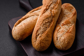 Crispy mini baguette with seeds and grains, salt and spices