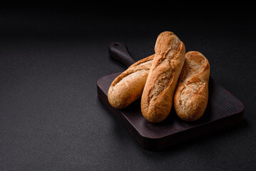 Crispy mini baguette with seeds and grains, salt and spices