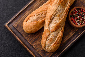 Crispy mini baguette with seeds and grains, salt and spices