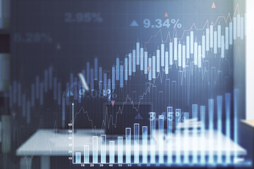 Double exposure of abstract creative financial diagram and modern desk with computer on background, banking and accounting concept