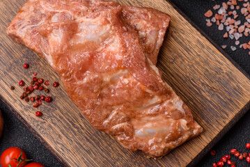 Raw pork or beef ribs in honey sauce with salt, spices