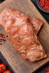 Raw pork or beef ribs in honey sauce with salt, spices