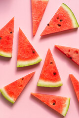 Watermelon slices on a pink background. Healthy food, watermelon - full of antioxidants and vitamins, summer menu, diet table