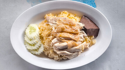 Chicken rice on a plate in a restaurant