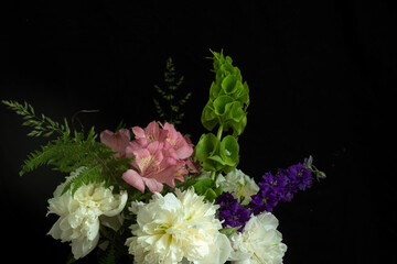 Mixed Floral Bouquet Against Black Background