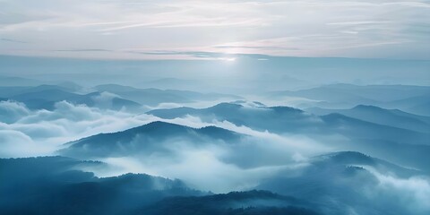 Morning Fog and Clouds Over Mountain Landscape A Stunning Sunrise Scenery. Concept Landscape Photography, Sunrise Scenery, Morning Fog, Mountain Views, Cloudy Skies