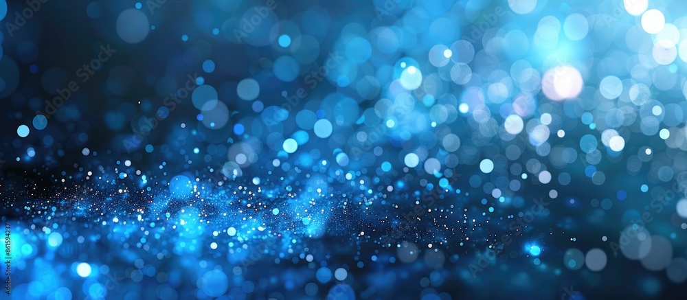 Aufkleber Blue particle background with abstract natural bokeh elements providing copy space image.