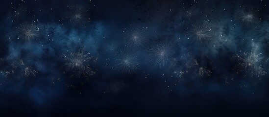 Obraz premium Panoramic banner with rustic dark blue texture capturing long fireworks during the night with a top view perspective and empty space for text. with copy space image. Place for adding text or design