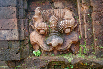 Hoi An, Vietnam - 6 Feb, 2024: Stone carvings at the ancient My Son Hindu temple, Champa kingdom, Vietnam