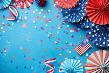 Obraz premium Celebrate with patriotic American decorations featuring paper fans and colorful confetti on a vibrant blue background. Generated AI