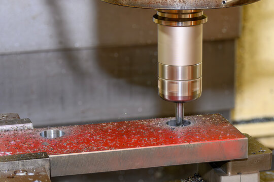 The CNC milling machine bore cutting at hard material parts.