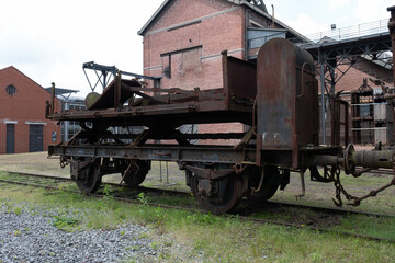 Industrial machines from an old abandoned coal mine, old and rusty.