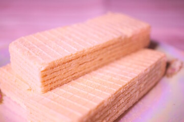 Sweet waffle on the table. A light snack.