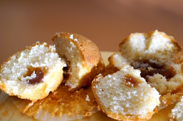 Sliced muffins on the table. Sweets.