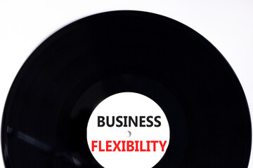 Business flexibility symbol. Concept words Business flexibility on beautiful white black vinyl disk. Beautiful white paper background. Business flexibility concept. Copy space.