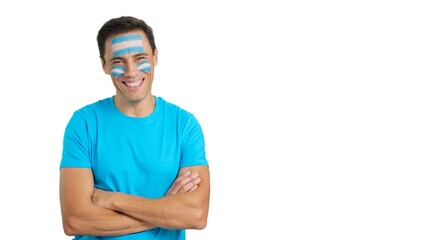 Man standing with argentine flag painted on face smiling