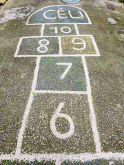 Fototapeta premium Hopscotch game painted on the floor of a neighborhood in Rio de Janeiro.