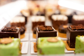 Types of cakes. Delicious cakes in bulk at the patisserie counter