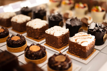 Types of cakes. Delicious cakes in bulk at the patisserie counter