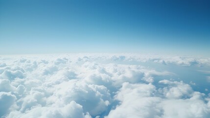 Fototapeta premium Heavenly Clouds Adrift in the Boundless Blue Sky